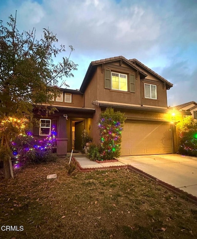 view of front of property featuring a garage