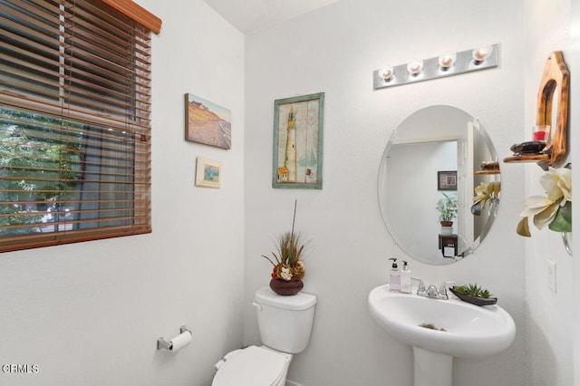 bathroom with sink and toilet