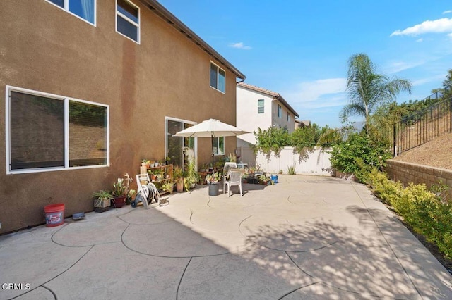 rear view of property with a patio area