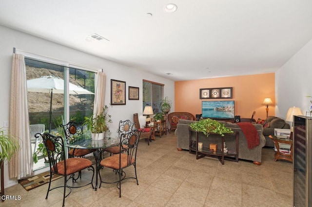 dining area with wine cooler