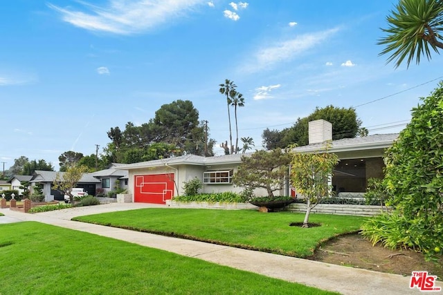 ranch-style house featuring a front lawn