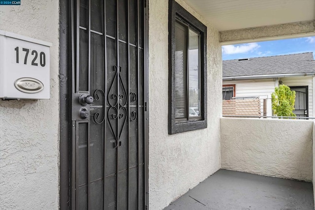 doorway to property with a balcony