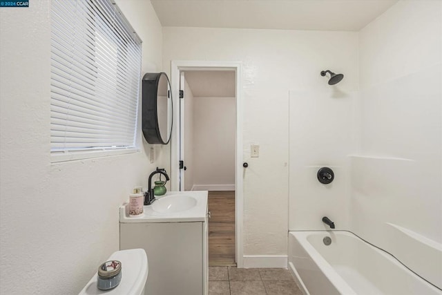 full bathroom with tile patterned floors, vanity, toilet, and shower / washtub combination