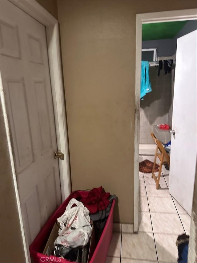 bathroom featuring tile patterned flooring