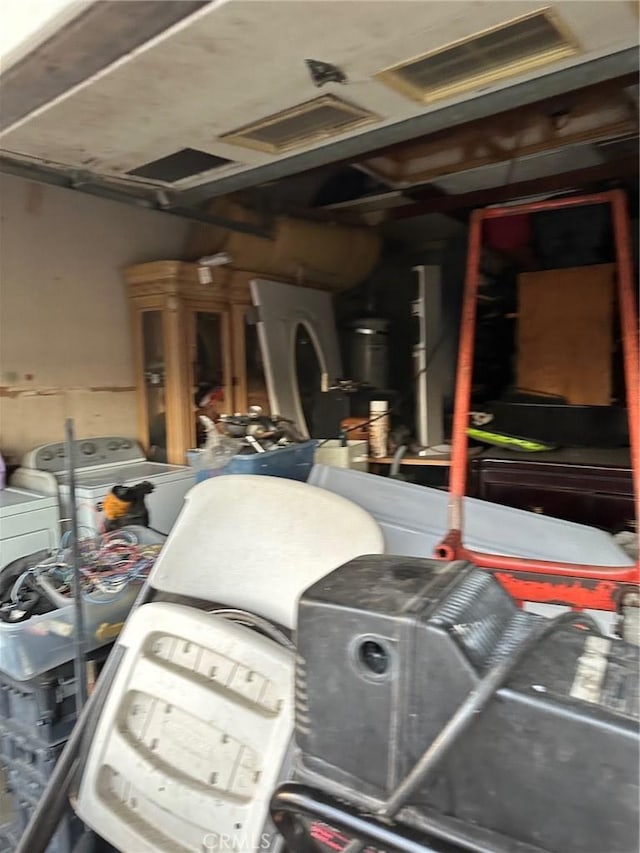 interior space with washing machine and dryer