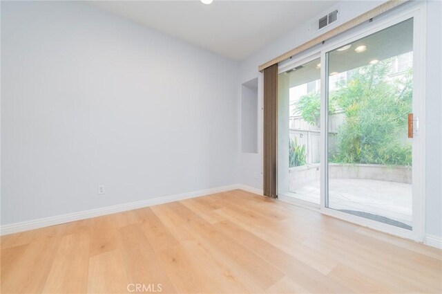 807 Yorkshire, Irvine, CA 92620 - spare room featuring light wood-style floors and baseboards