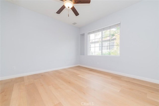 807 Yorkshire, Irvine, CA 92620 - spare room featuring light wood-type flooring, baseboards, and ceiling fan