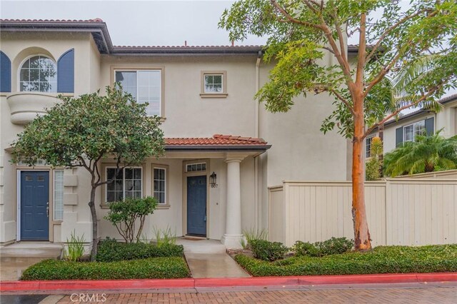 807 Yorkshire, Irvine, CA 92620 - mediterranean / spanish-style home featuring stucco siding and a tiled roof