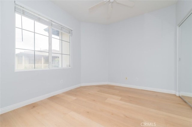 807 Yorkshire, Irvine, CA 92620 - unfurnished room with light wood finished floors, ceiling fan, and baseboards