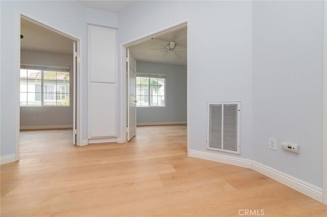 807 Yorkshire, Irvine, CA 92620 - hall featuring light wood finished floors and baseboards