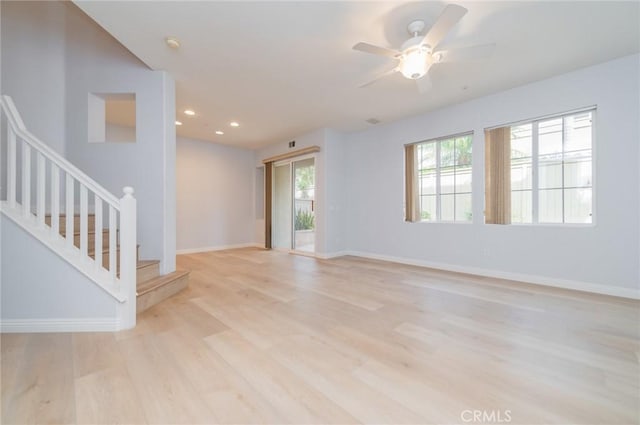 807 Yorkshire, Irvine, CA 92620 - empty room featuring light wood-type flooring, stairs, a ceiling fan, baseboards, and recessed lighting