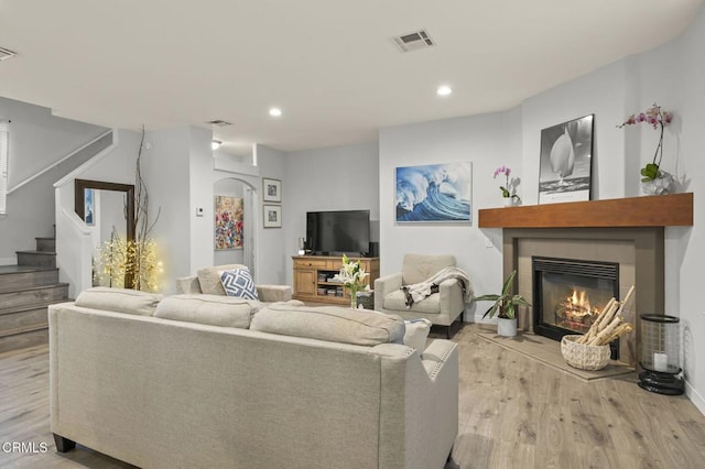 living room with light hardwood / wood-style floors