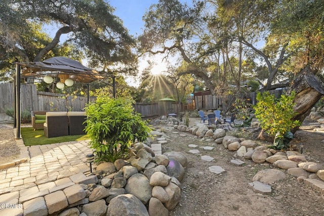 view of yard with a gazebo and a patio area