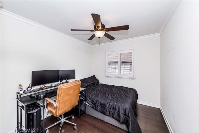 bedroom featuring ornamental molding, ceiling fan, and dark wood-type flooring