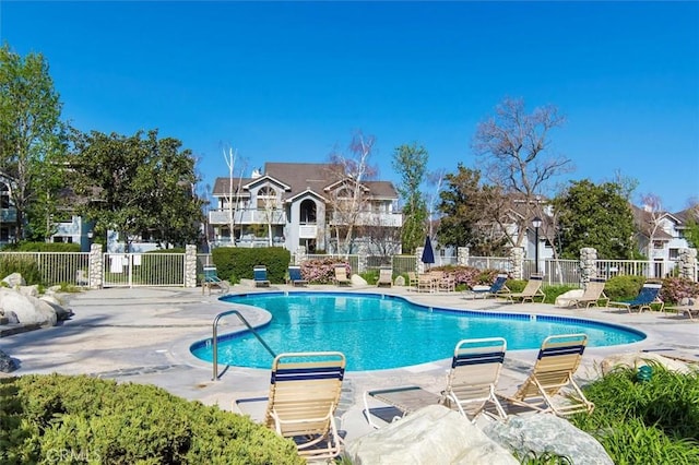 view of pool featuring a patio