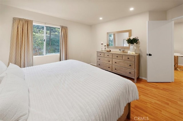 bedroom featuring light hardwood / wood-style floors