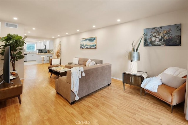 living room with light wood-type flooring