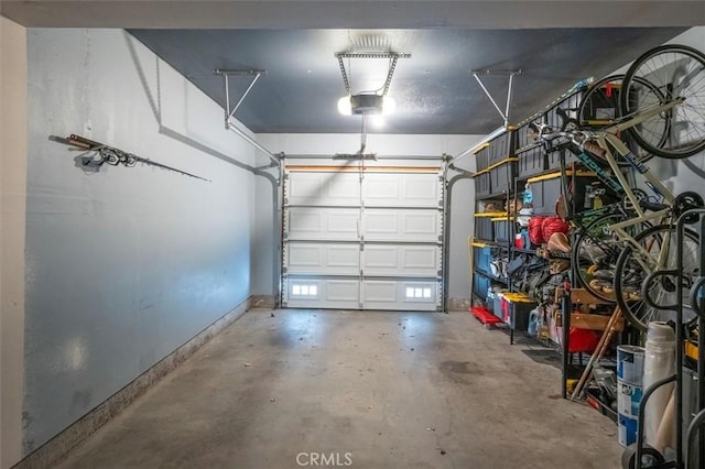 garage featuring a garage door opener