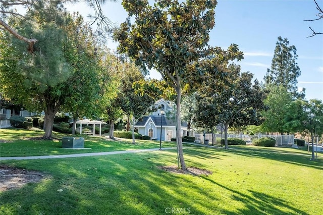 view of home's community featuring a yard