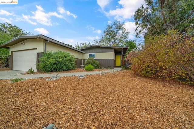 view of home's exterior with a garage