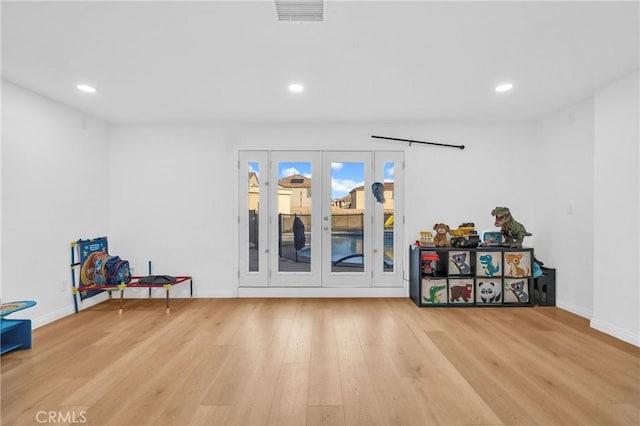 interior space with light hardwood / wood-style floors