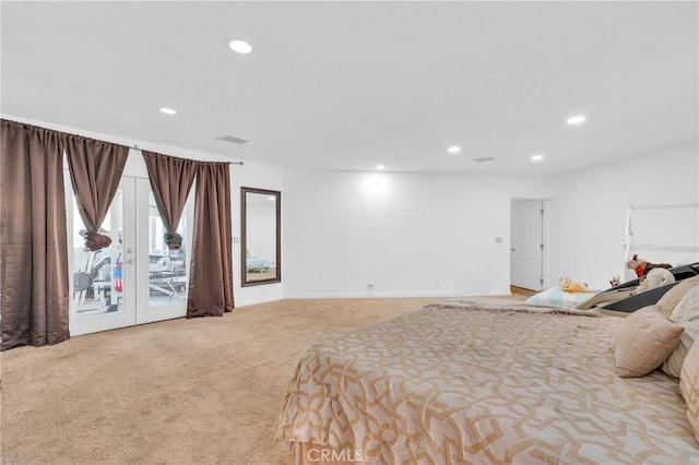 carpeted bedroom featuring access to exterior and french doors