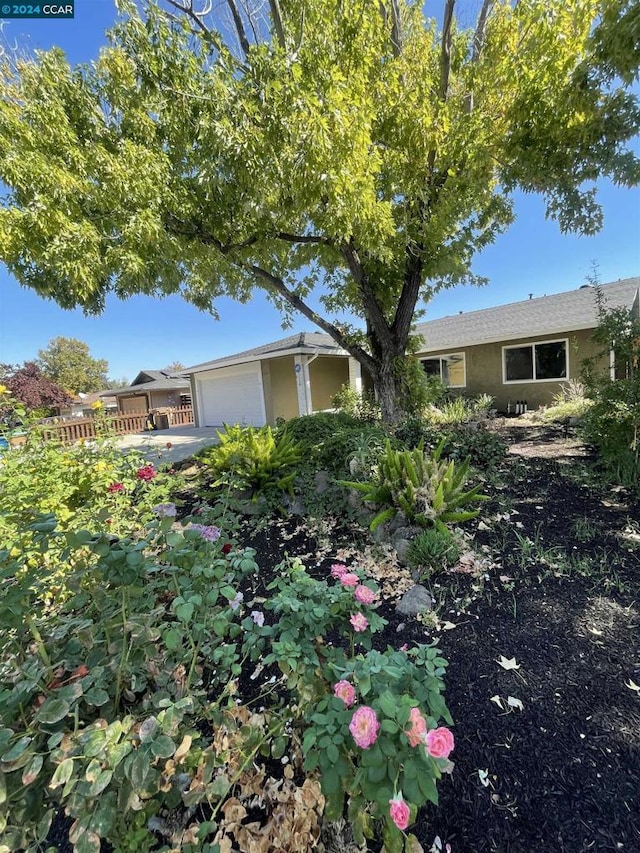 view of property exterior with a garage