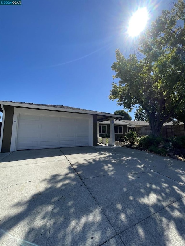 view of front of property with a garage