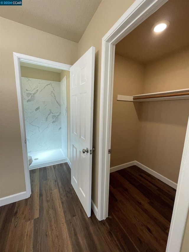 hall featuring dark hardwood / wood-style floors