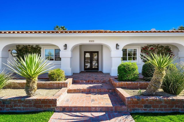 entrance to property with french doors