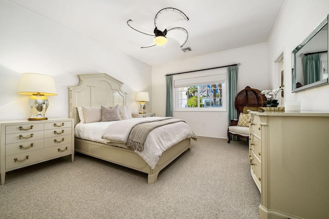 bedroom with light carpet, crown molding, and ceiling fan