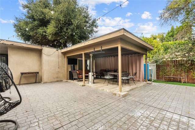 view of patio / terrace with an outdoor hangout area and ceiling fan