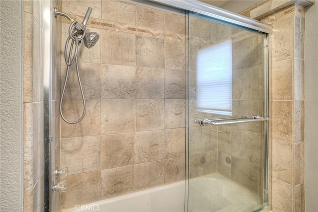 bathroom featuring enclosed tub / shower combo