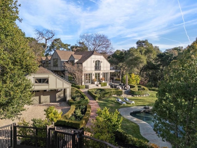 view of property's community with a patio