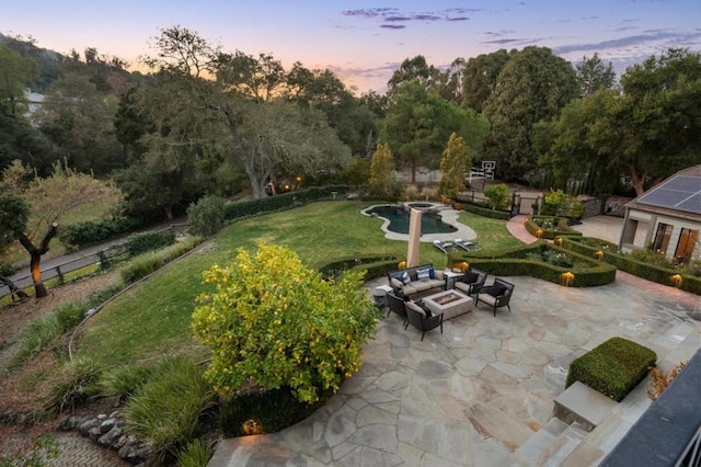 view of home's community featuring an outdoor living space, a patio, and a lawn