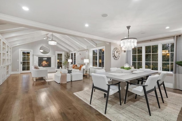 dining area with an inviting chandelier, dark hardwood / wood-style flooring, and lofted ceiling with beams