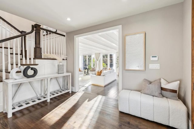 living room with dark hardwood / wood-style floors