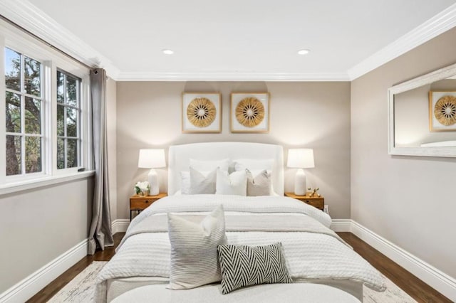 bedroom featuring crown molding and dark wood-type flooring