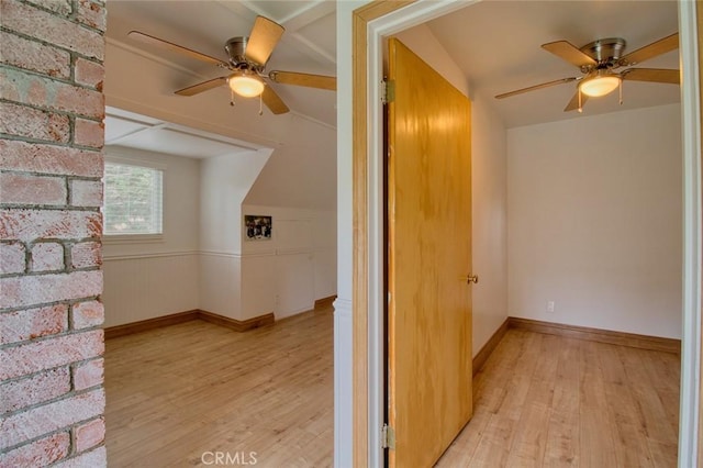 bonus room featuring ceiling fan and light hardwood / wood-style flooring