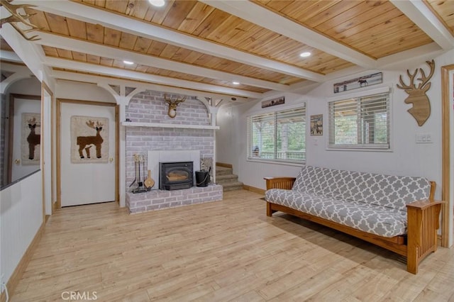 living area featuring wood ceiling, beam ceiling, and light wood-type flooring