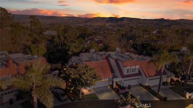 aerial view at dusk with a mountain view