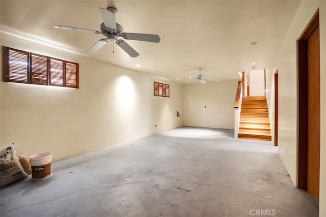 unfurnished room with ceiling fan