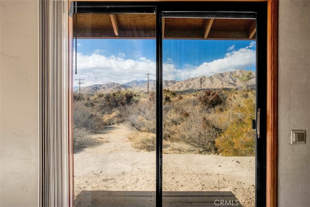 doorway featuring a mountain view