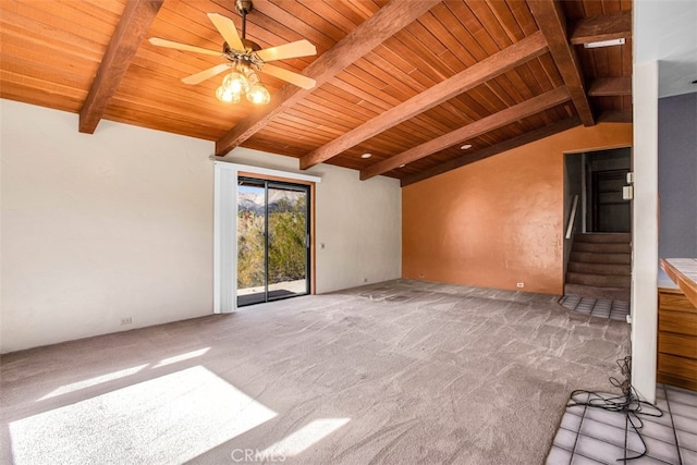 unfurnished living room featuring carpet, lofted ceiling with beams, ceiling fan, and wood ceiling