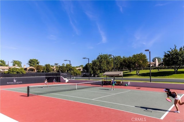 view of sport court featuring basketball court