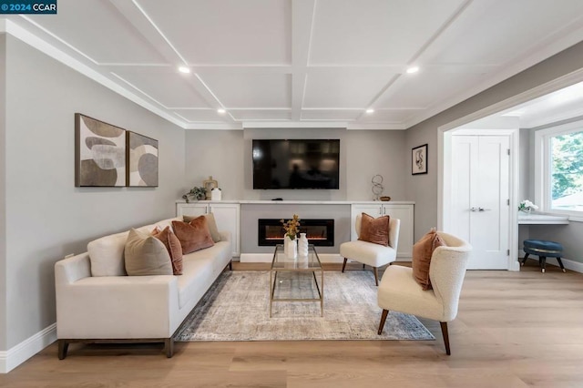 living room featuring light hardwood / wood-style floors and coffered ceiling