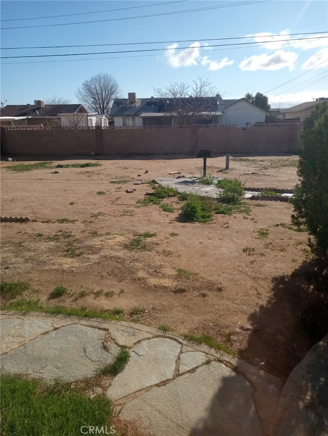 view of yard featuring fence