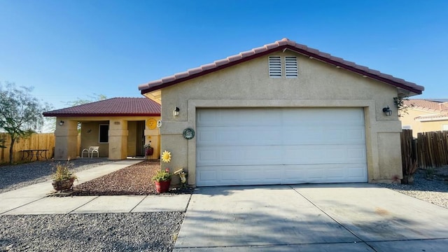 ranch-style house featuring a garage