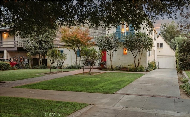 view of front of home with a yard