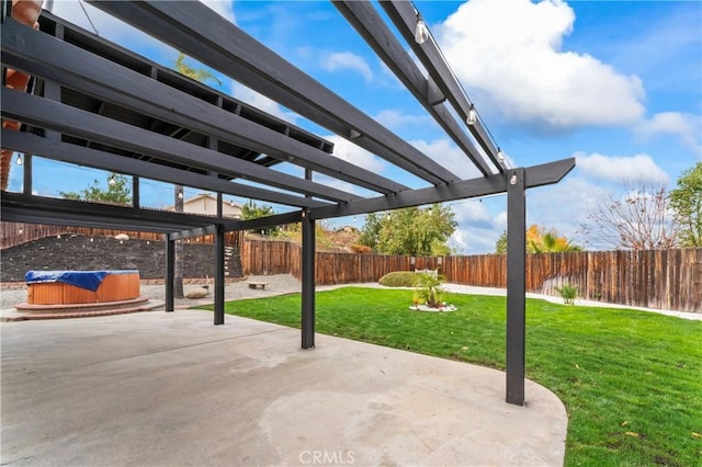 view of patio / terrace with a pergola and a hot tub